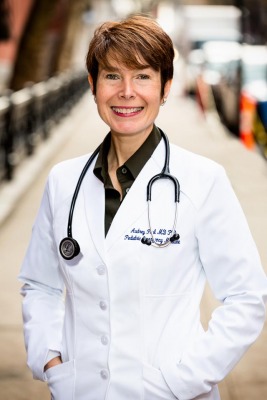 Professional-headshot-of-a-doctor Professional-headshot-of-a-doctor