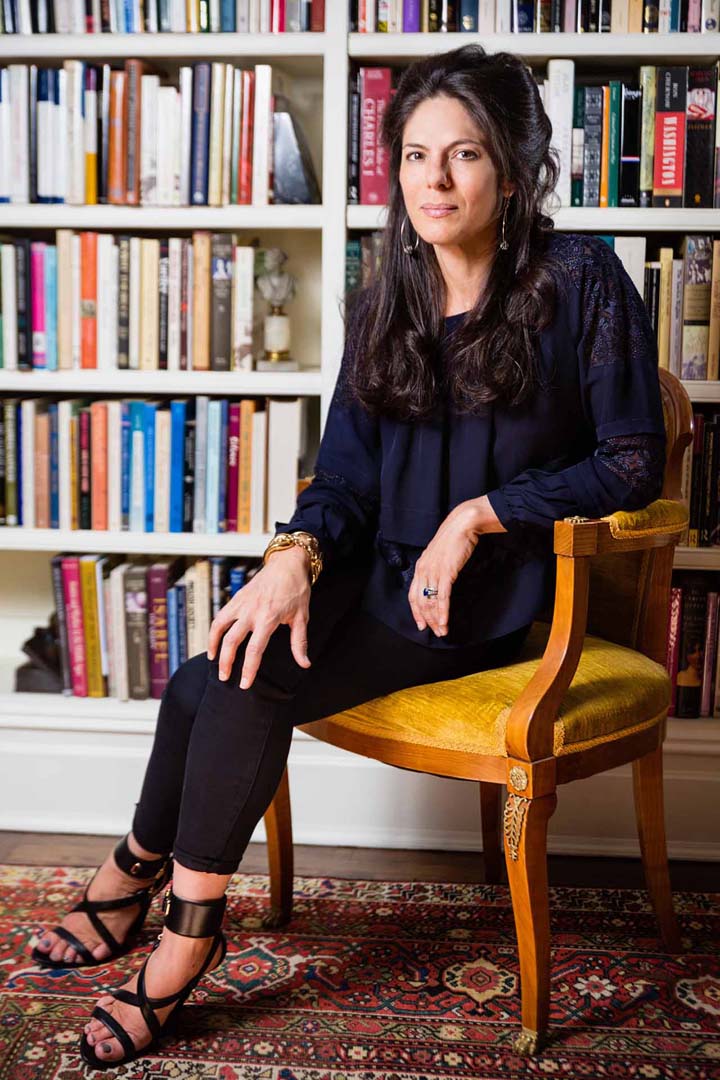 Author-portrait-in-front-of-bookshelves Author-portrait-in-front-of-bookshelves