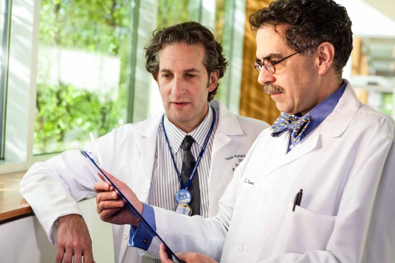 Environmental-portrait-two-doctors-conferring