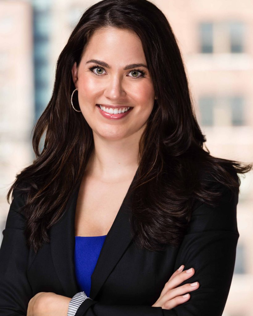 Corporate headshot of female executive