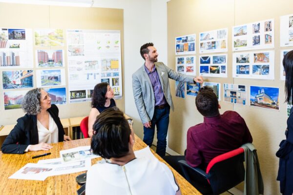 Team portraits don't have to be static. It's often more engaging to photograph them in action, as pictured here.