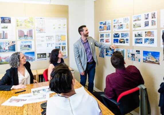 Team portraits don't have to be static. It's often more engaging to photograph them in action, as pictured here.